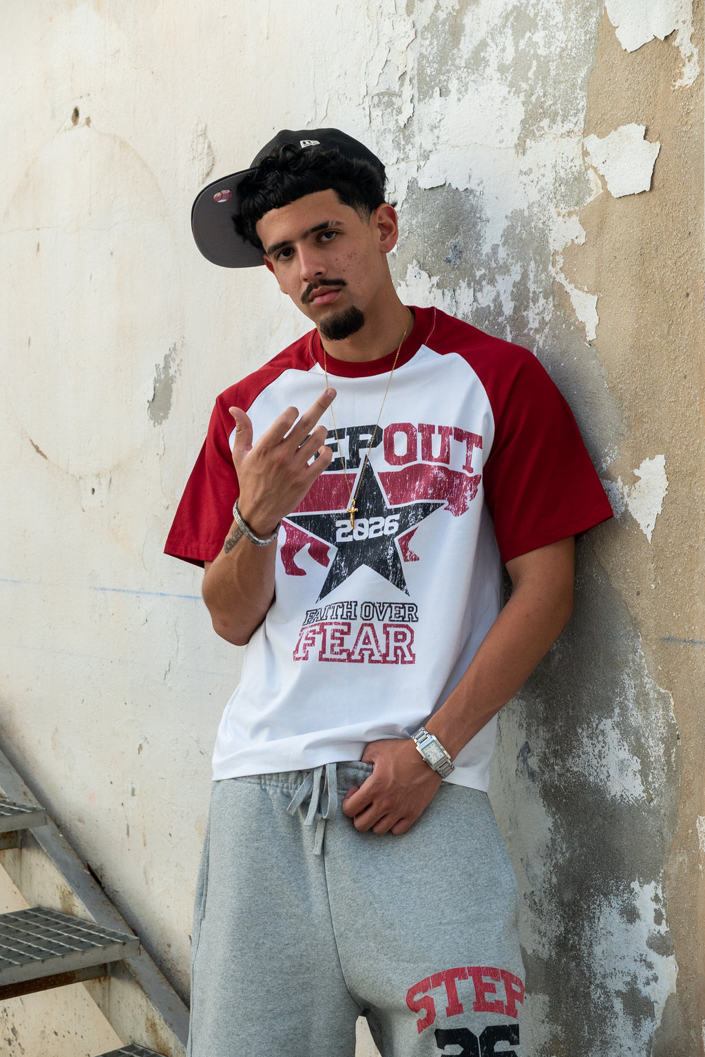 White/red “Faith over fear” tee