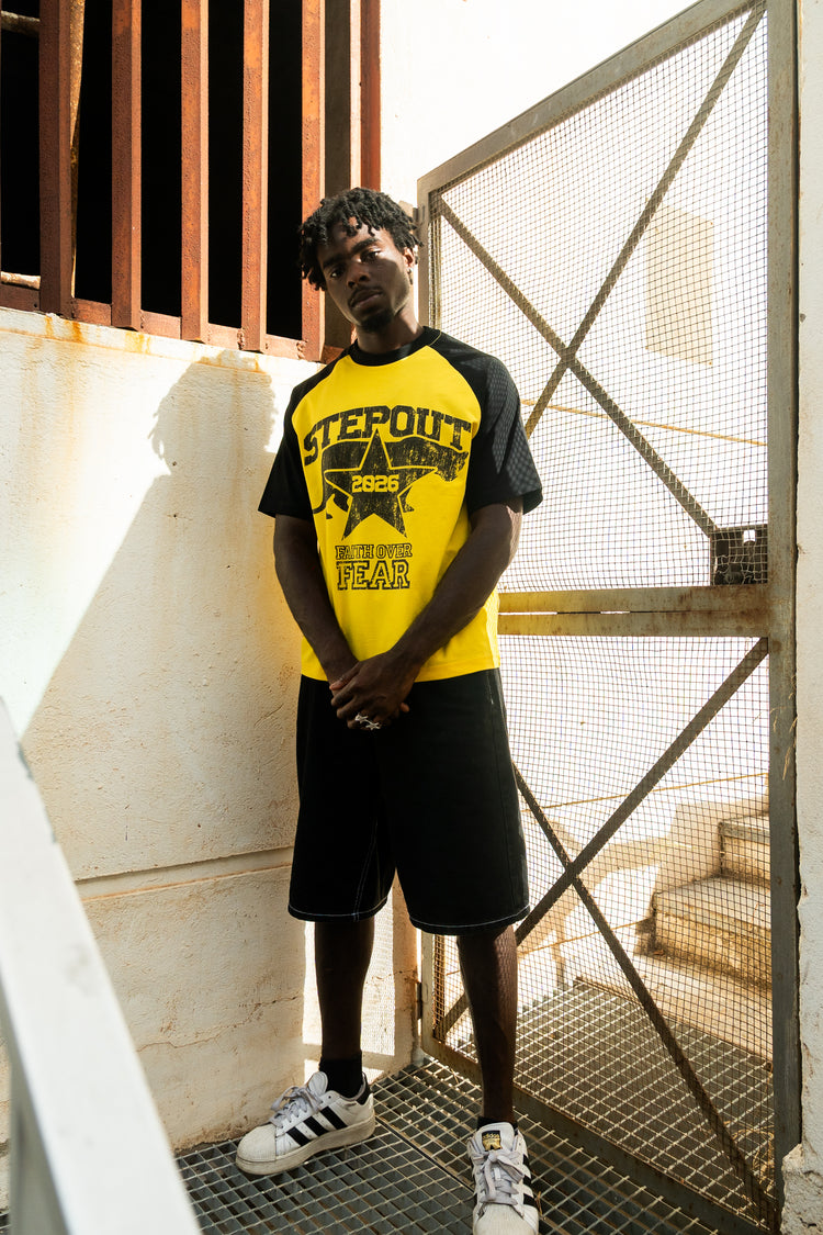 Yellow/black “Faith over fear” tee